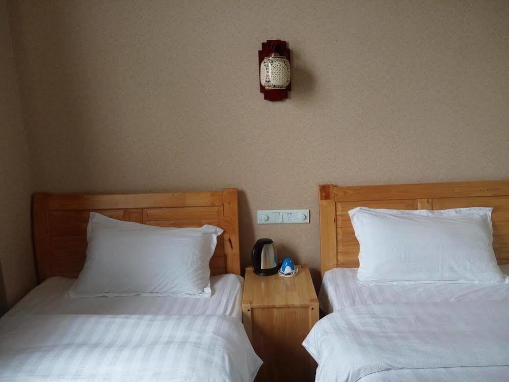 Shuanglang Jinxiangyuan Hotel Dali Shuanglang Bagian luar foto